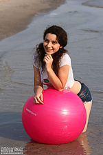 Cute angel on the beach