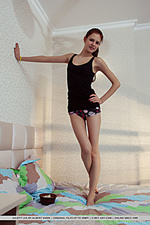 Juliett lea newcomer juliett lea displays her petite body with puffy tits and pink nipples on the bed.