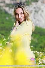 Amaly amaly bares her gorgeous body and delectable pussy as she delightfully poses among the beautiful flowers.