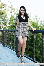 Yvonne a yvonne a playfully poses by the veranda as she bares her pink pussy.