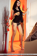 Anatali anatali displays her delectable pussy and puffy tits on the sofa.