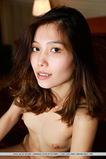 Anna aki new model anna aki displays her petite body and small pussy on the bed.