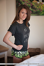 Cameran new model cameran playfully strips on the bed baring her nubile body.