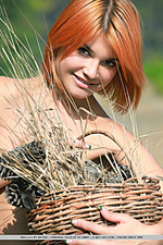 Violla a redhead violla a bares her sexy, naked body and big tits outdoors.