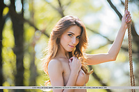 Cara mell cara mell shows off her long and lean physique, slender limbs, and smooth assets as she poses in a wooden swing