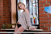 Hilary wind newcomer hilary wind strips by the window baring her delectable body.