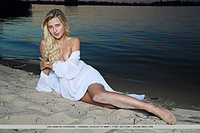 Lisa dawn lisa dawn poses on the sand as she bares her sweet ass.