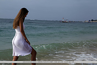 Elin elin displays her smoldering body as she strips by the beach.