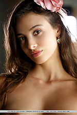 Calypso calypso shows off her smoldering hot body as she strips on the sofa.