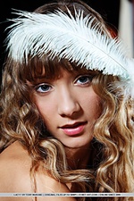 Budoir themed set for a doll-faced cutie with nubile body.