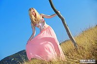 Blonde babe in grassland