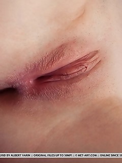 Sigrid sigrid flaunts her smooth, pink pussy as she poses by the window.