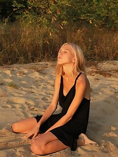 Adorable teen nymph getting nude exposing her nice slim body with perfect tits on the sand