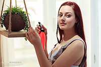 Model playing on couch