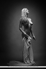 Mary tries to emulate the roman goddess of love and beauty with her statuesque figure and luscious body in elegant, artistic poses.